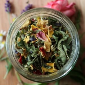 looking in the jar top of Sleepy Tea with the fresh ingredients in the background