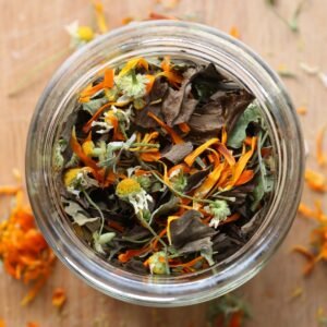Looking in the top of the jar of Gut Soothe Artisan Herbal Tea